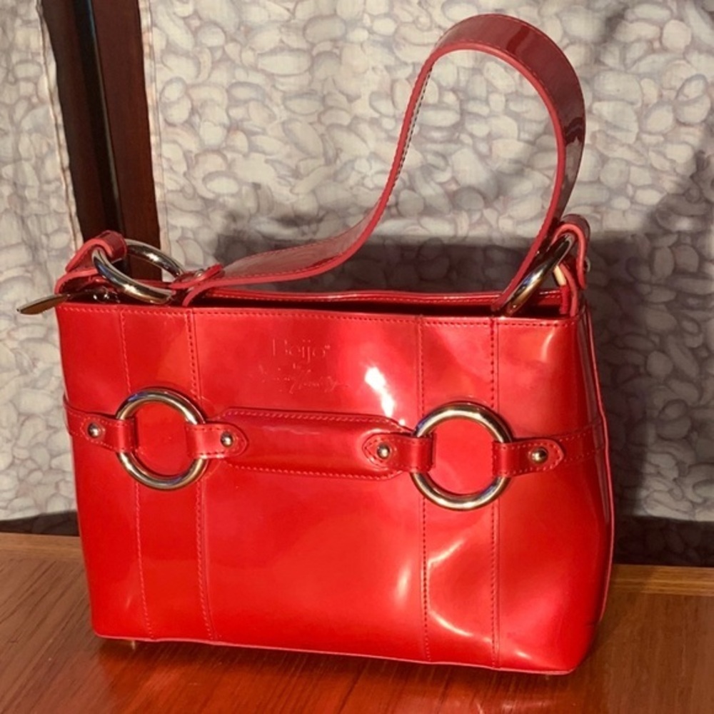 Beijo by Susan Handley pearl red hand bag.